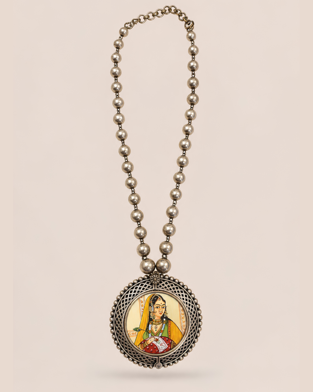 Vistaar handcrafted statement necklace inspired by Indian miniature art with an antique silver-finish beaded chain and portrait pendant by House of Evia.