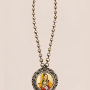 Vistaar handcrafted statement necklace inspired by Indian miniature art with an antique silver-finish beaded chain and portrait pendant by House of Evia.