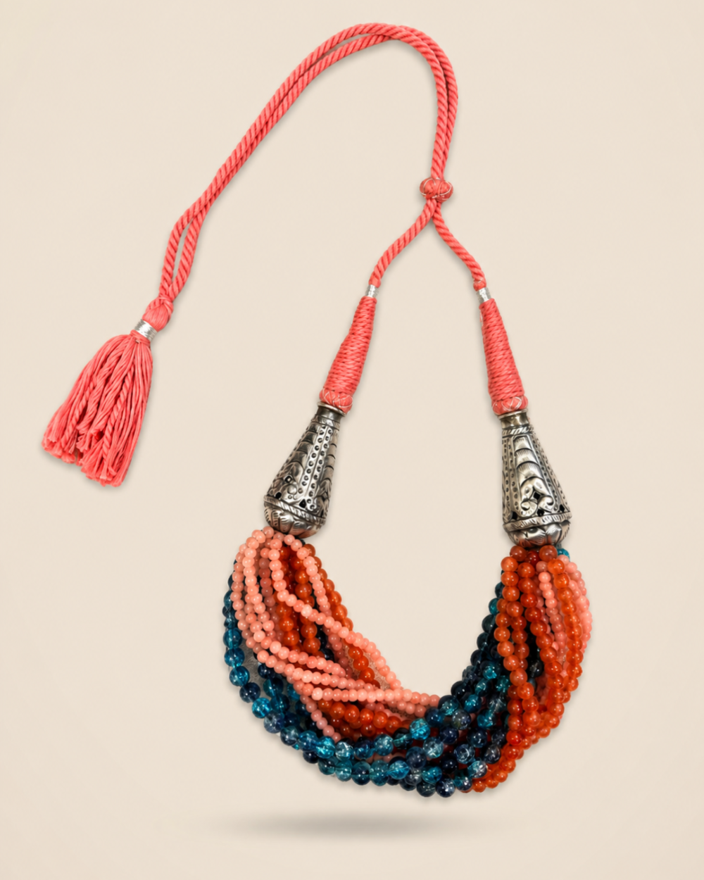 Adaa (अदा) handcrafted multi-strand beaded neckpiece with coral, orange and teal beads and brass with silver coated detailing