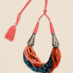 Adaa (अदा) handcrafted multi-strand beaded neckpiece with coral, orange and teal beads and brass with silver coated detailing