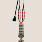 Handcrafted Gulnaar green and red statement neckpiece with brass coated silver detailing and ornate jhumka pendant
