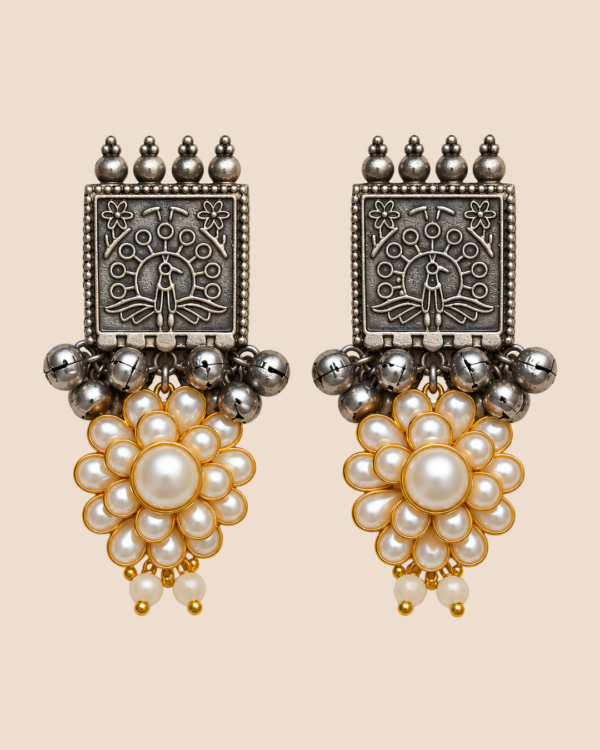 Two-tone silver and gold choker with kundan, pearl and red stone florals on an adjustable black tassel cord, with matching pearl drop earrings